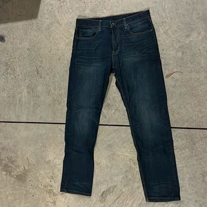 Men’s Levi’s denim jean. Regular Taper 502. Medium wash. Size 33/32.